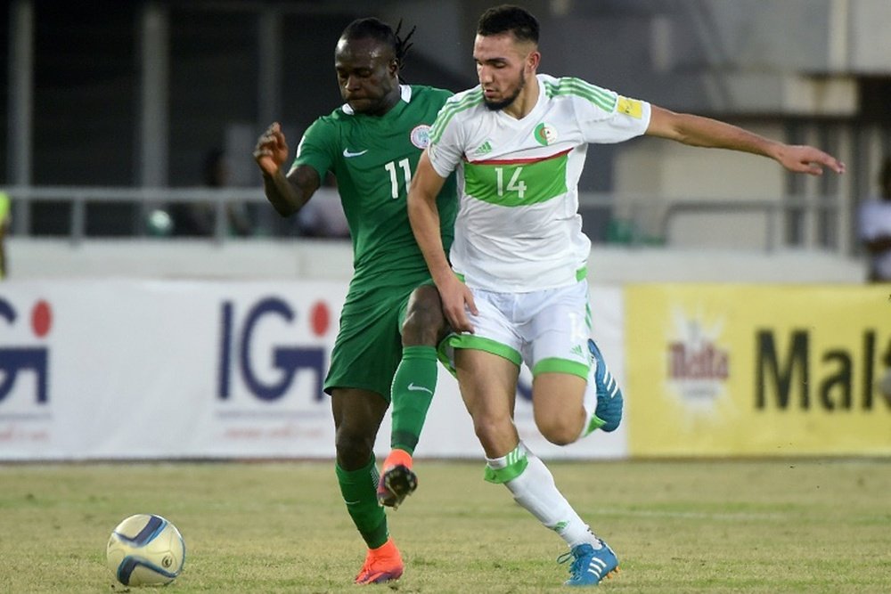 Moses (left) has been accused of picking and choosing when he wants to play for Nigeria. AFP
