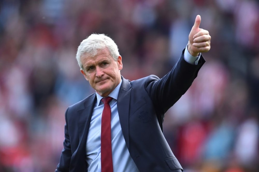 Mark Hughes is taking Southampton's game with Watford very seriously. AFP