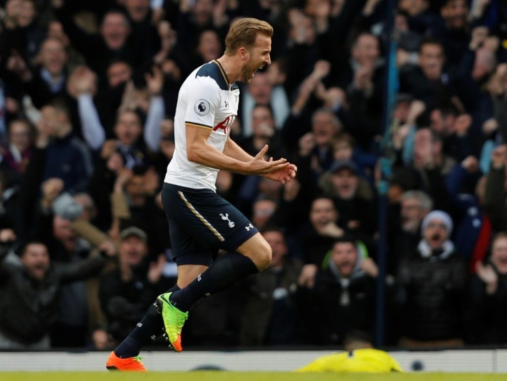 r Harry Kane celebrates after scoring the opening goal for Tottenham. AFP