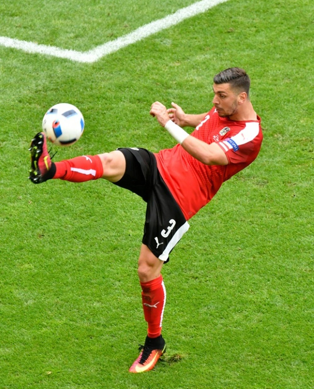 Dragovic in action for Austria. AFP