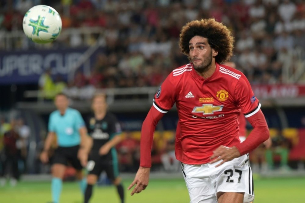 Fellaini will miss United's 3,200-mile trip to Moscow. AFP