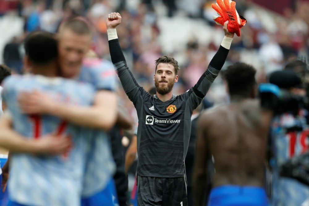 De Gea pushes Henderson away from the starting XI. AFP