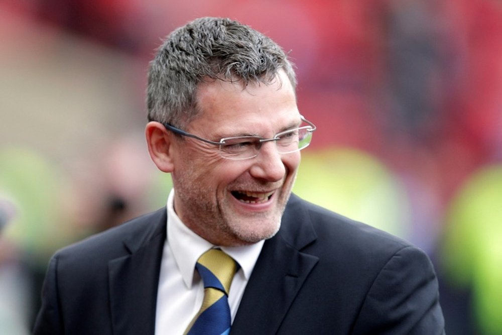 Criag Levein is not happy with the charge. AFP