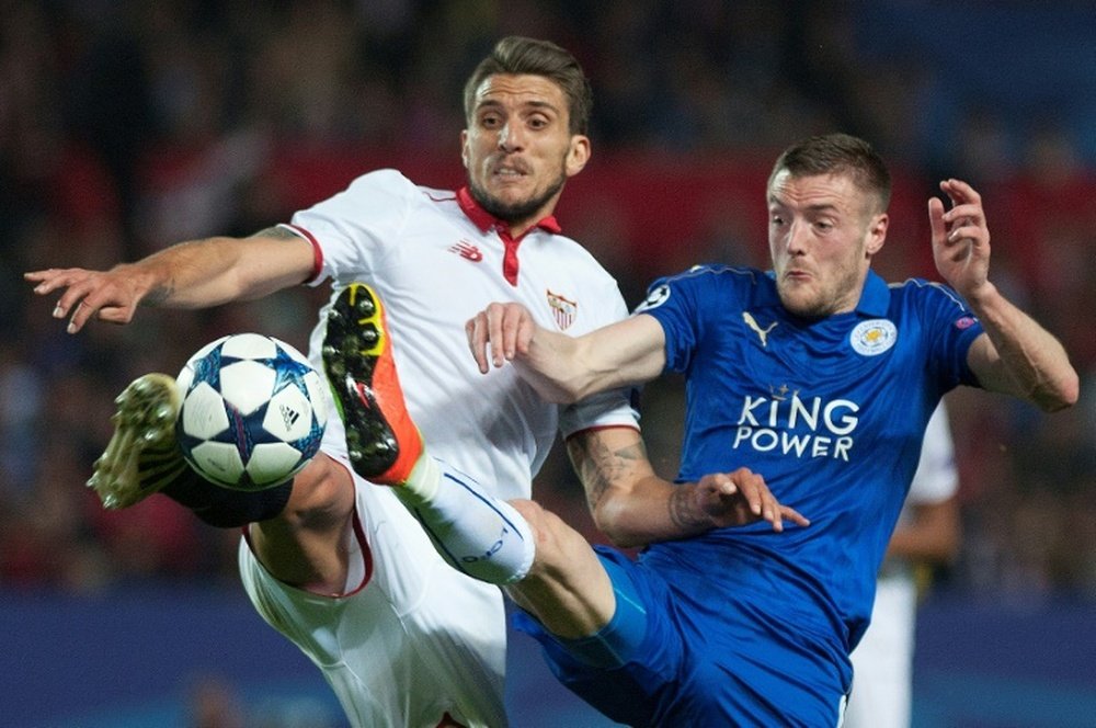 Sevilla's Carrico vies with Leicester City's Vardy during their Champions League match. AFP