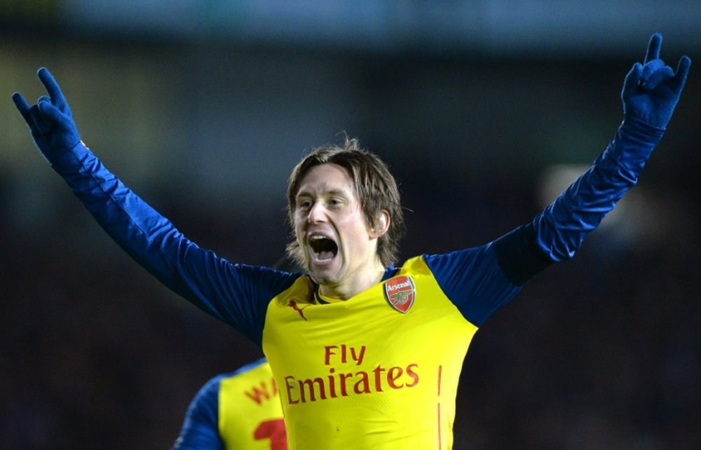 Arsenal's midfielder Tomas Rosicky celebrates scoring his team's third goal during the FA Cup fourth round football match between Brighton & Hove Albion and Arsenal in Brighton, England on January 25, 2015