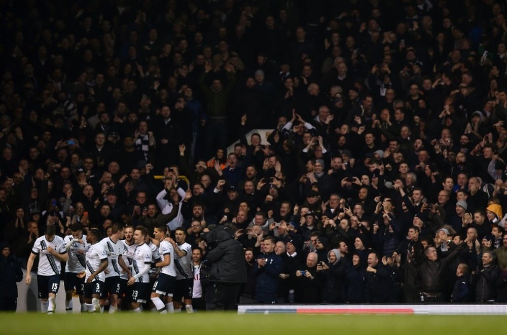 Tottenham Hotspurs players celebrate a goal during the English Premier League football match between Tottenham Hotspur and West Bromwich Albion at White Hart Lane in London, on April 25, 2016