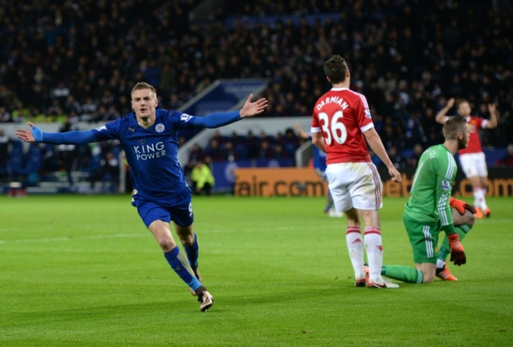 Leicester Citys English striker Jamie Vardy (L) celebrates after scoring during the English Premier League football match between Leicester City and Manchester United at the King Power Stadium in Leicester, central England on November 28, 2015