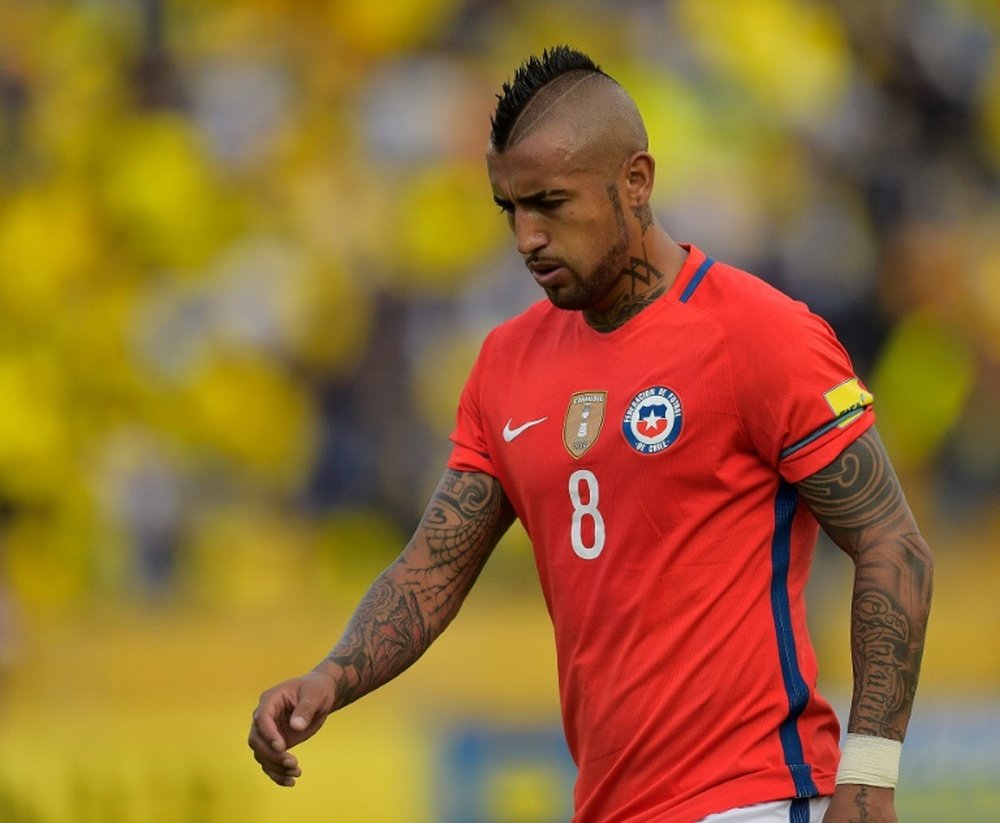 Chiles Arturo Vidal reacts at the Russia 2018 World Cup football qualifier match against Ecuador in Quito, on October 6, 2016
