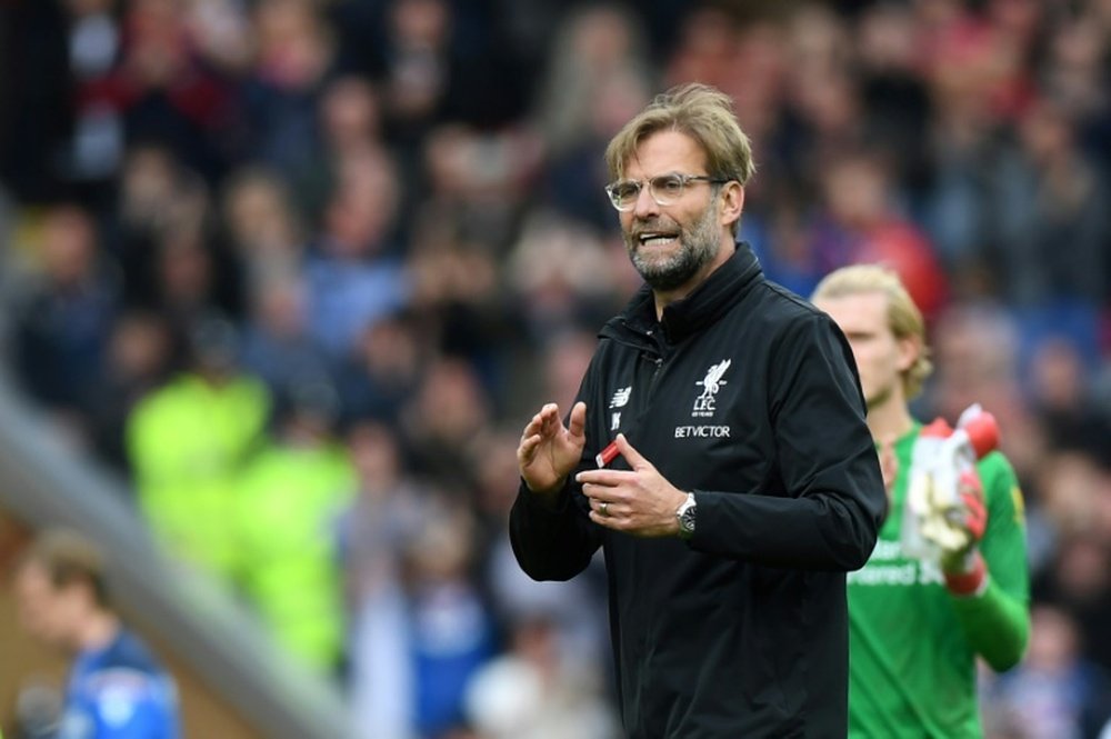 Klopp will be without five first-team players for the game. AFP