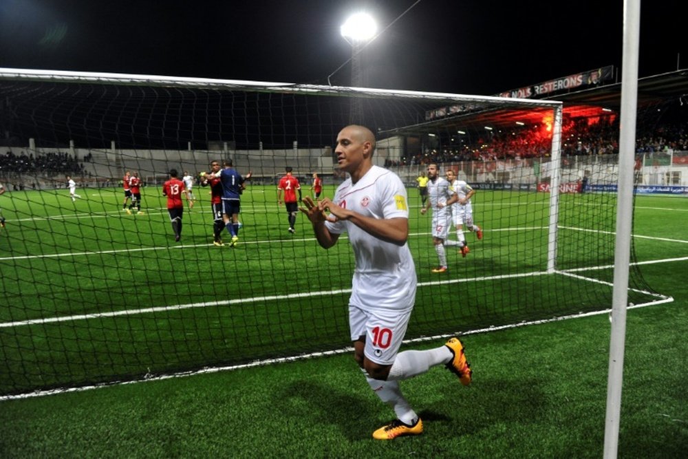 Tunisias Khazri Wahbi (C) celebrates after scoring a penalty against Libya. AFP