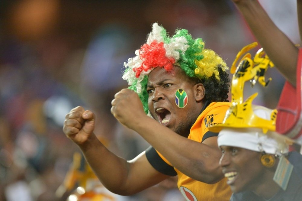 Orlando Pirates supporters celebrate in Soweto on November 2, 2013