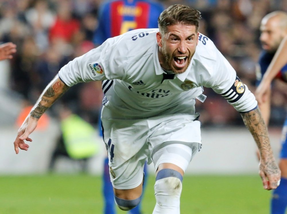 Ramos celebrates heading in Madrid's late equaliser. AFP