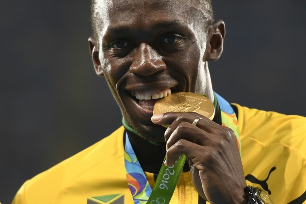 Bolt to announce football signing. AFP