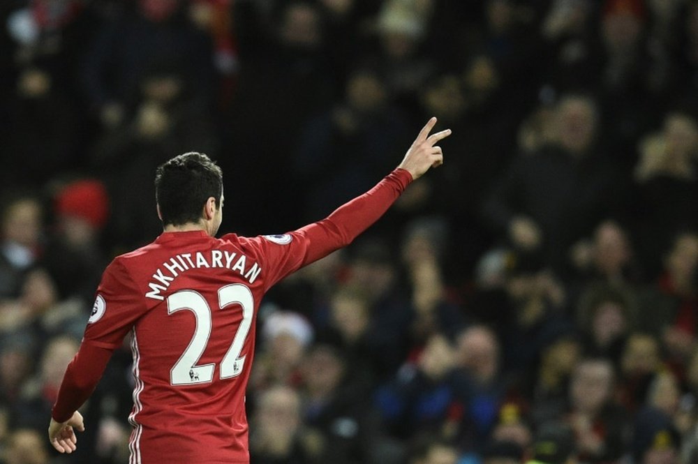 Mkhitaryan celebrating one of his spectacular goals. AFP