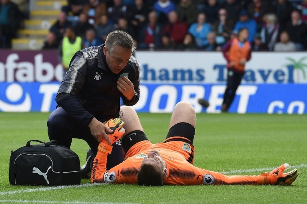 Burnley's Sean Dyche expects to be without Tom Heaton for months after dislocating his shoulder. AFP