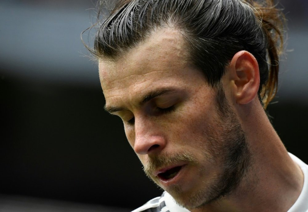 Gareth Bale clings to his contract. AFP