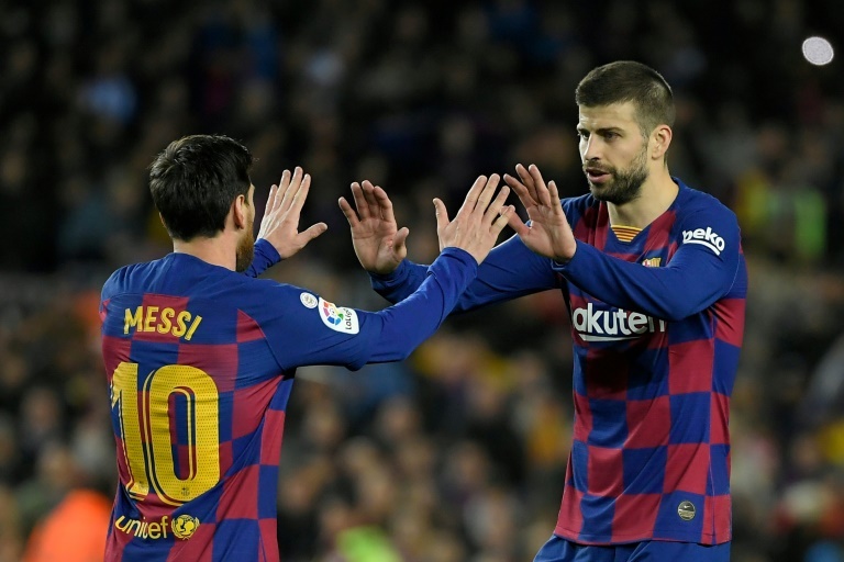 Messi y Piqué, en un partido con el Barça