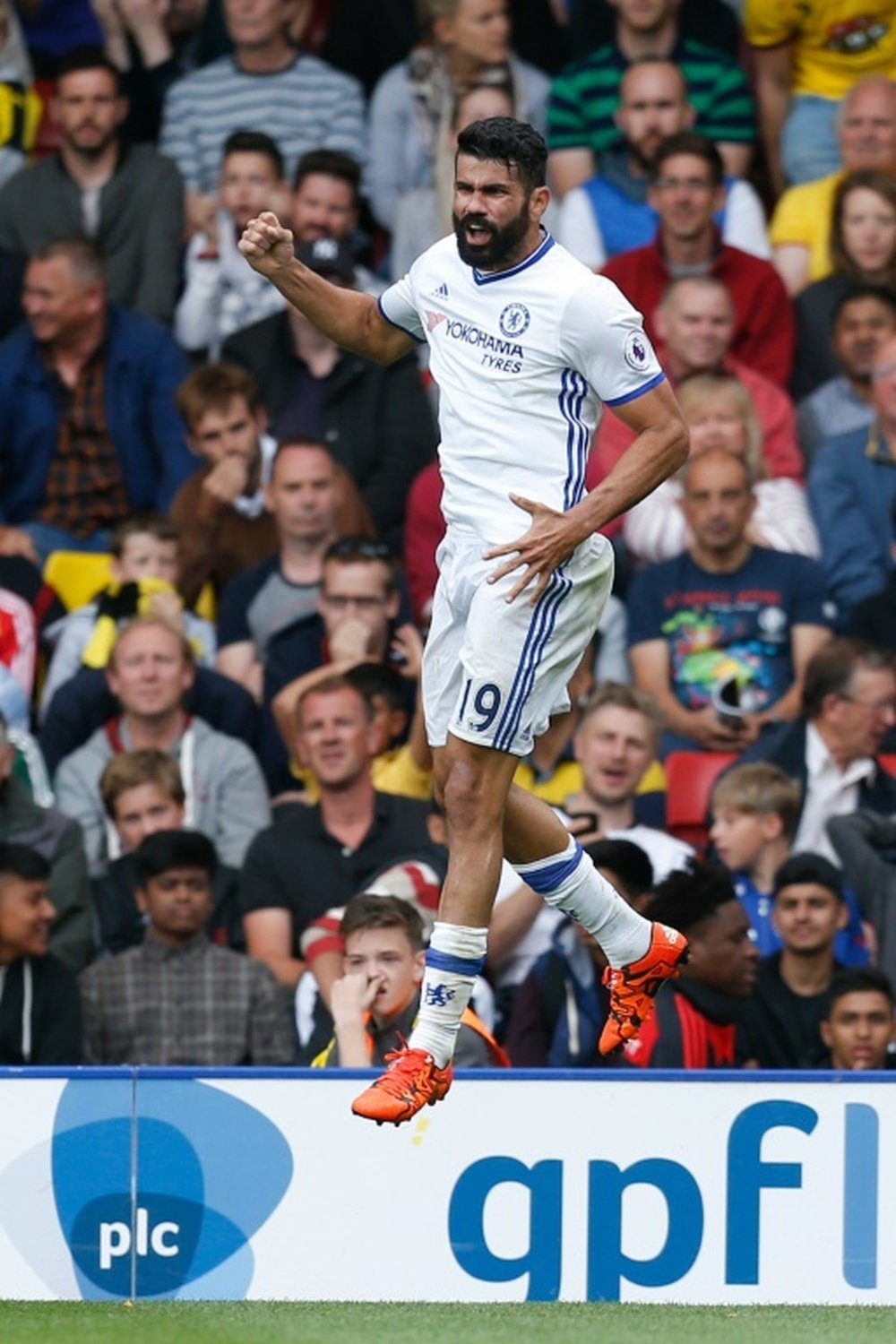 Costa celebrates his winning goal against Watford. AFP