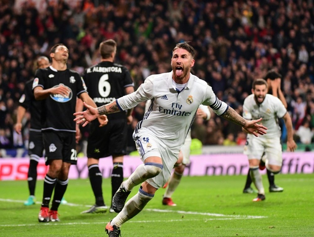 Real Madrids defender Sergio Ramos celebrates after scoring on December 10, 2016