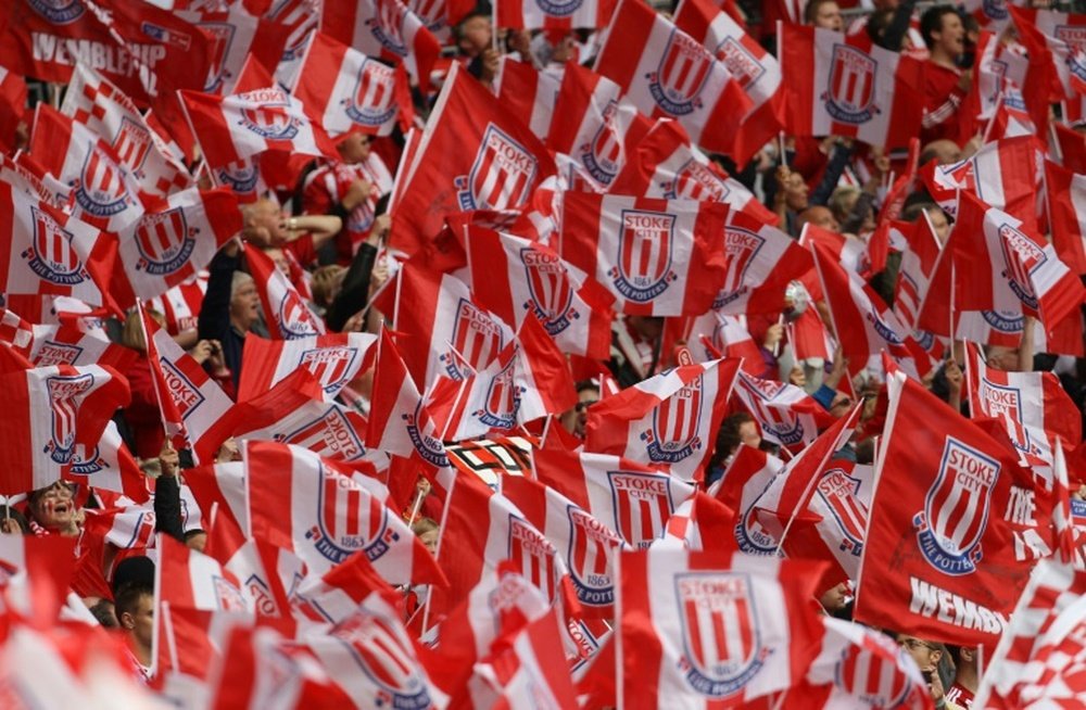 Stoke fans prepare to watch their team during the FA Cup final football match between Manchester City and Stoke City at Wembley Stadium in London, on May 14, 2011