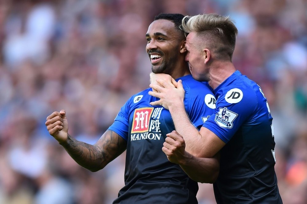 Bournemouths Callum Wilson (L), celebrates scoring a goal with Matt Ritchie (R) during the English Premier League football match between West Ham United and Bournemouth in Upton Park, East London on August 22, 2015