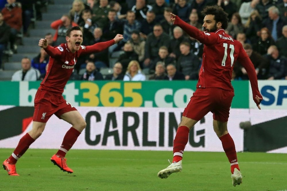Robertson offre le deuxième but de Liverpool à Salah ! AFP