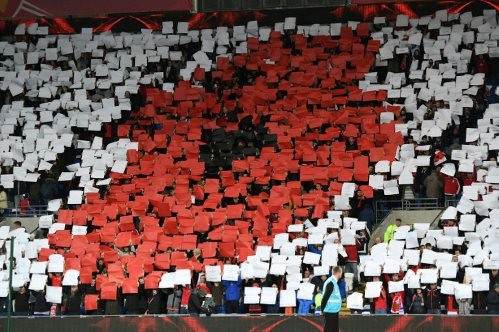 Wales supporters form a poppy ahead of a match against Serbia in 2016. AFP