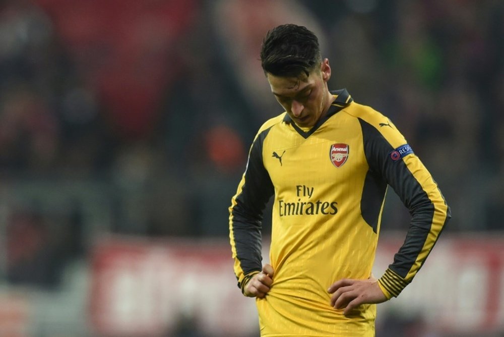 Arsenal's midfielder Mesut Ozil reacts during the 5-1 defeat to Bayern. AFP