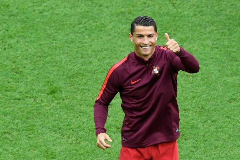 Portugals Cristiano Ronaldo made history as the first player to score in four European Championships with a double in a thrilling 3-3 draw with Hungary on June 22, 2016