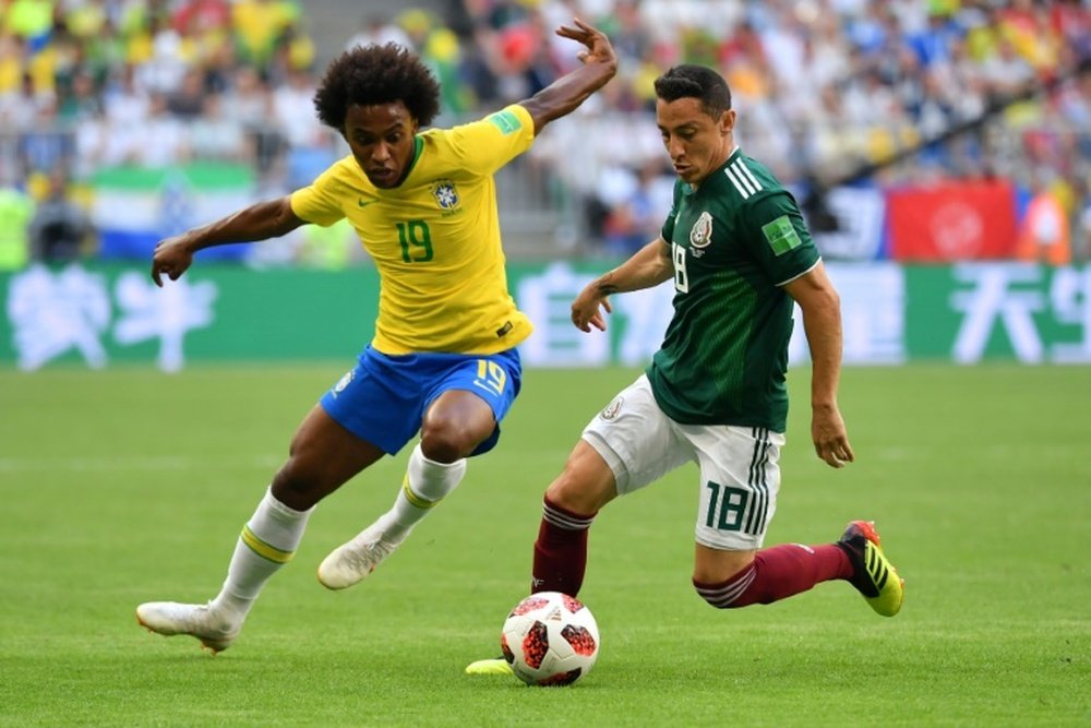 Willian se centra en Brasil. AFP/Archivo