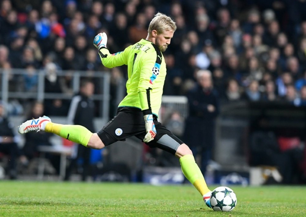 Kasper Schmeichel passes the ball during the  match between FC Copenhagen and Leicester City. AFP
