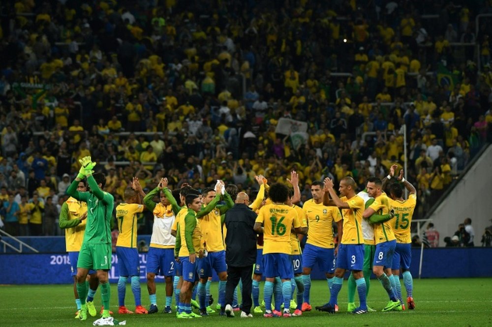 Brazilian players celebrate at the end of their 2018 FIFA World Cup qualifier
