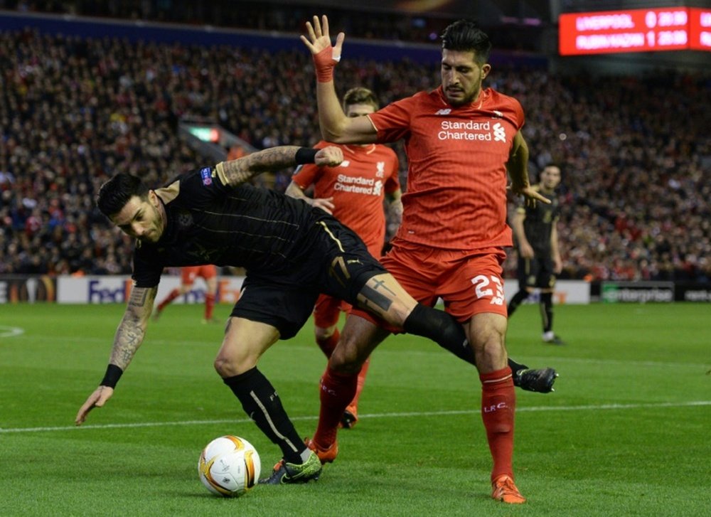 Liverpools German midfielder Emre Can (R) vies for the ball with Rubin Kazans Bulgarian midfielder Blagoy Georgiev (L) during a UEFA Europa League group B football match in Liverpool, England, on October 22, 2015