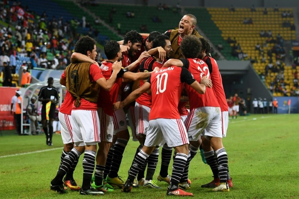 Egypts players celebrate a goal on January 21, 2017