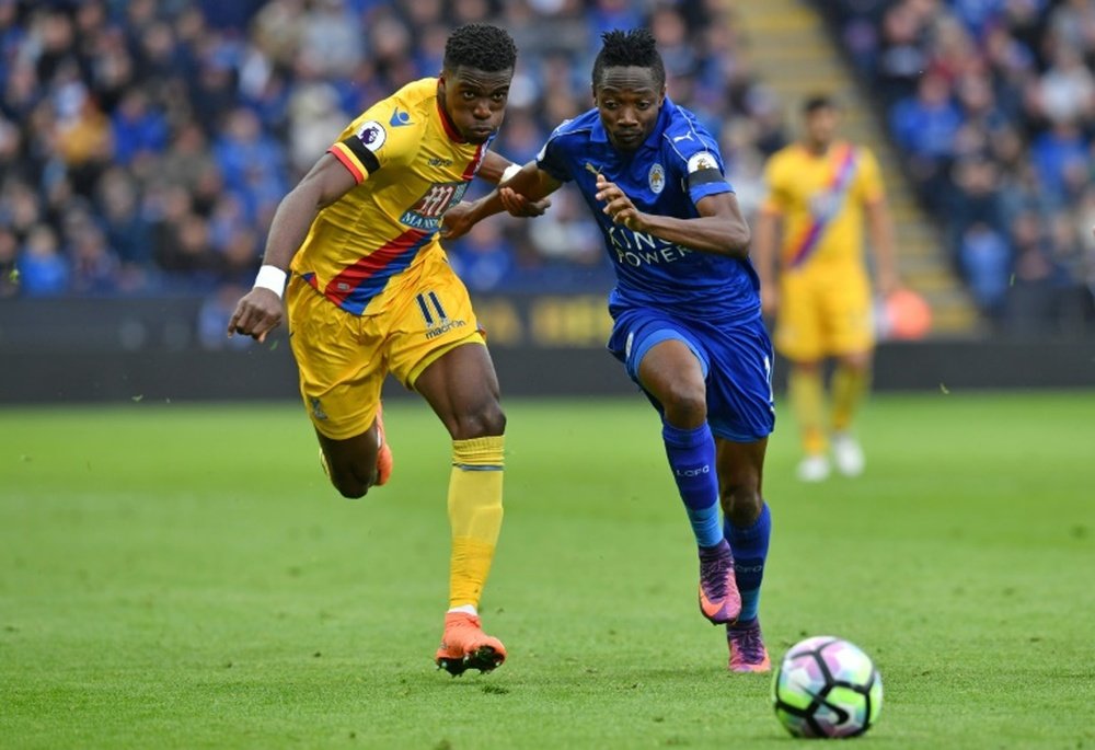 Ahmed Musa (R) vies with Wilfried Zaha during the English Premier League match at Leicester. AFP