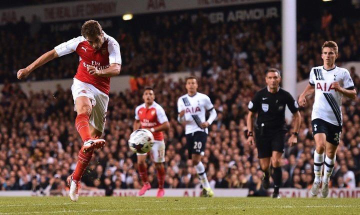 Unlikely Arsenal hero Flamini downs Spurs