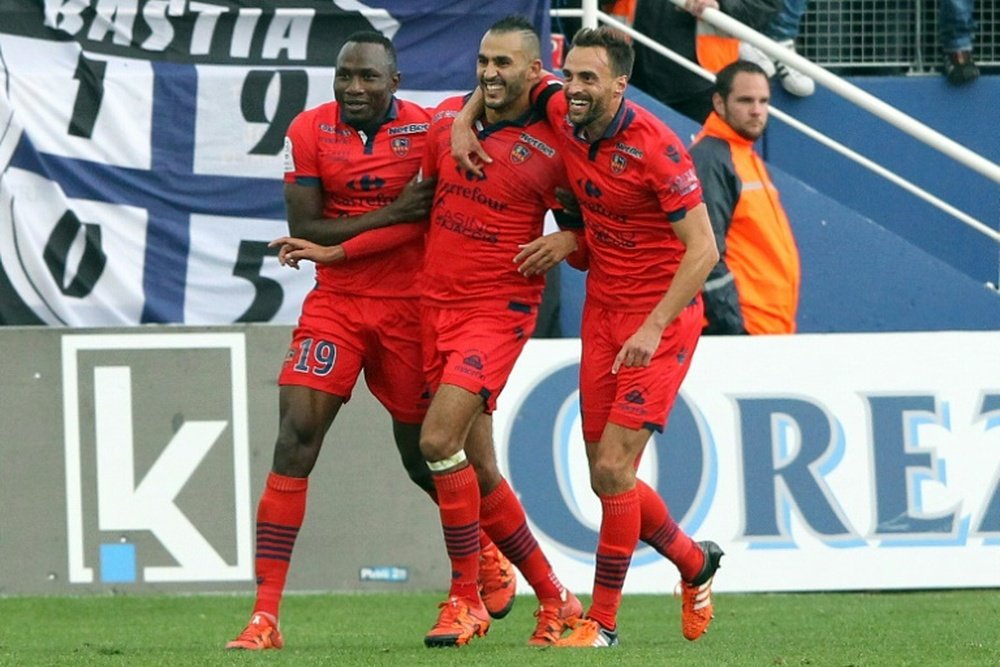 Ajaccios forward Khalid Boutaib (C) is congratulated by teammates after scoring a goal during the L1 football match against Bastia on November 22, 2015, at the Armand Cesari stadium