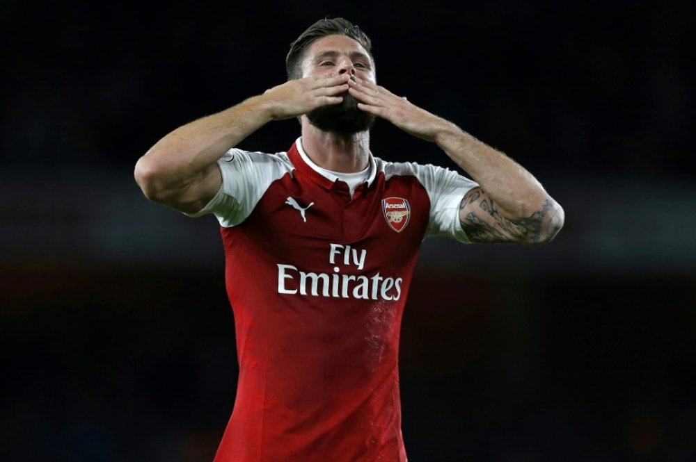 Giroud has confirmed he will be staying at the Emirates this summer. AFP