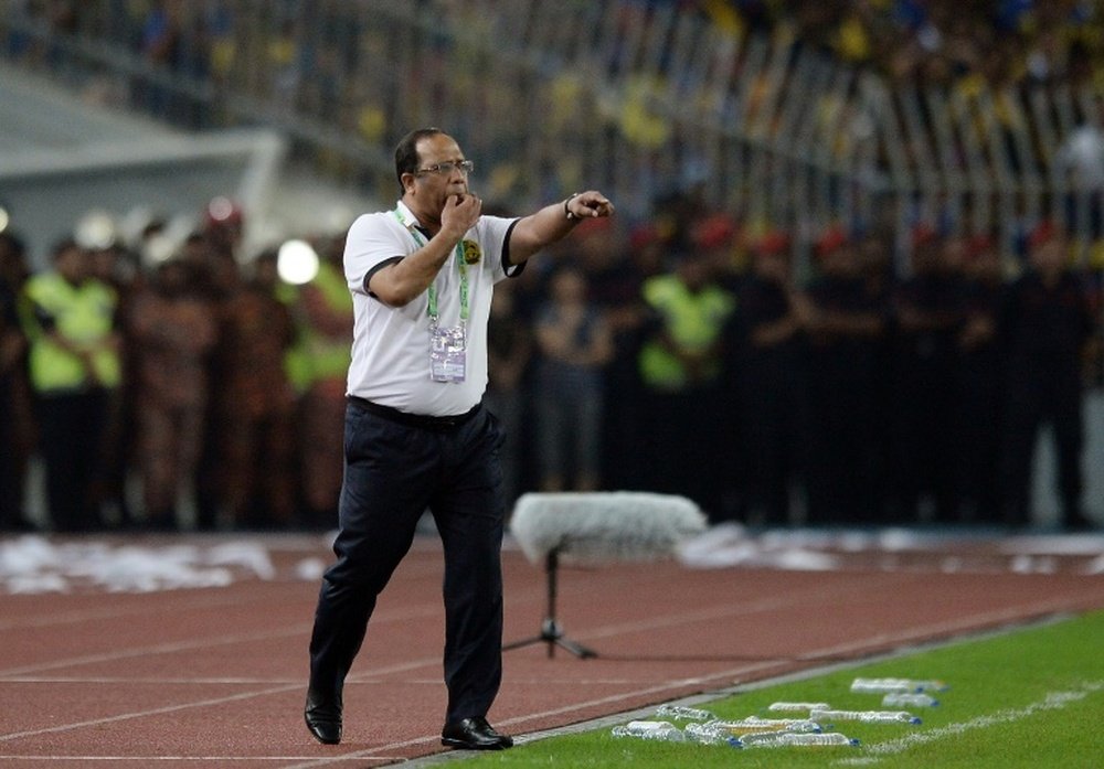 Coach Dollah Salleh stepped down on Saturday, two days after presiding over Malaysias thrashing in Abu Dhabi which made history as their worst ever defeat