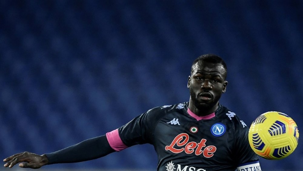 Napoli were without Kalidou Koulibaly and were beating 2-1 by Genoa. AFP