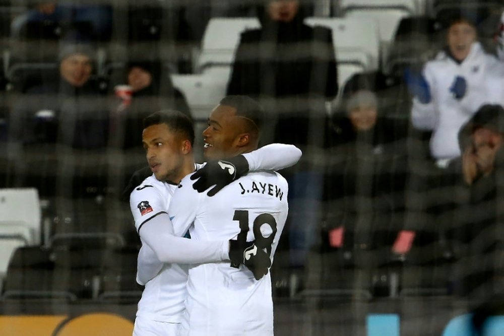 Ayew is keen on a move away from the Liberty Stadium. AFP