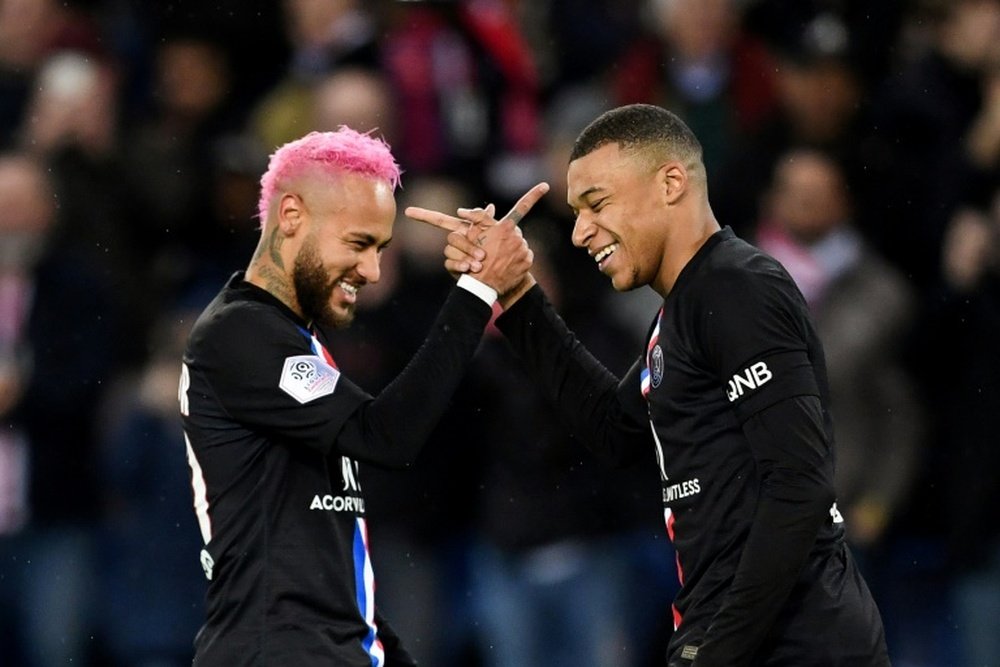 PSG are not thinking of sellling Neymar or Mbappe this summer. AFP