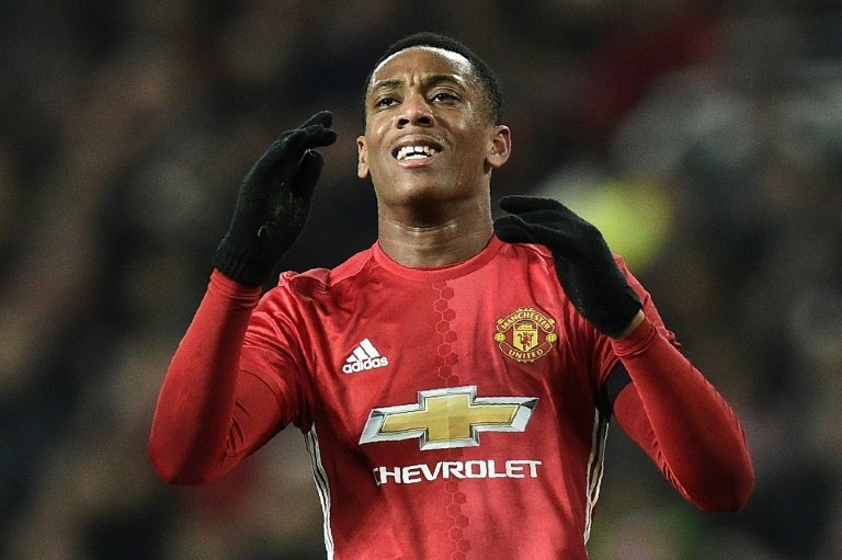 MArtial with his hand up. Goal