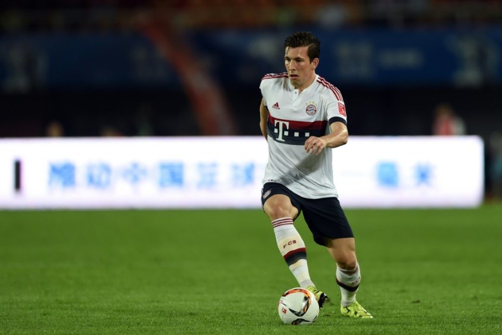 Pierre-Emile Hojbjerg controls the ball during a friendly match between Guangzhou Evergrande and Bayern Munich in Guangzhou on July 23, 2015