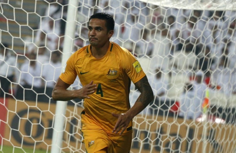 Tim Cahill celebrates scoring a goal during their 2018 World Cup qualifying match against UAE. AFP