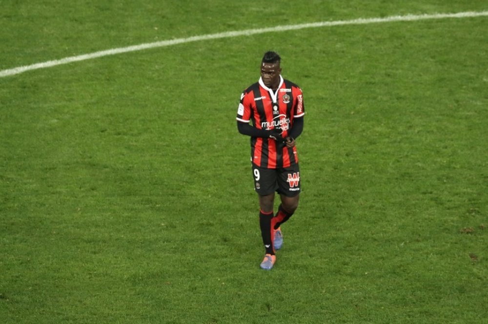 Nices Italian forward Mario Balotelli walks on the pitch during the French Ligue 1. AFP