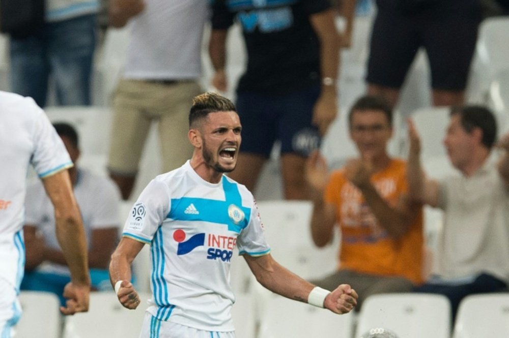 Olympique de Marseilles French midfielder Remy Cabella celebrates after scoring during the French Ligue 1 football match Olympique de Marseille versus Lorient on August 26, 2016 at the Velodrome stadium in Marseille, southern France