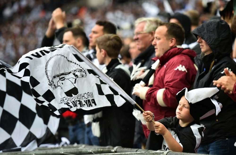 Derby County fans cheer for their team during the English Championship Play Off final football match between Derby Country and Queens Park Rangers at Wembley Stadium in London on May 24, 2014