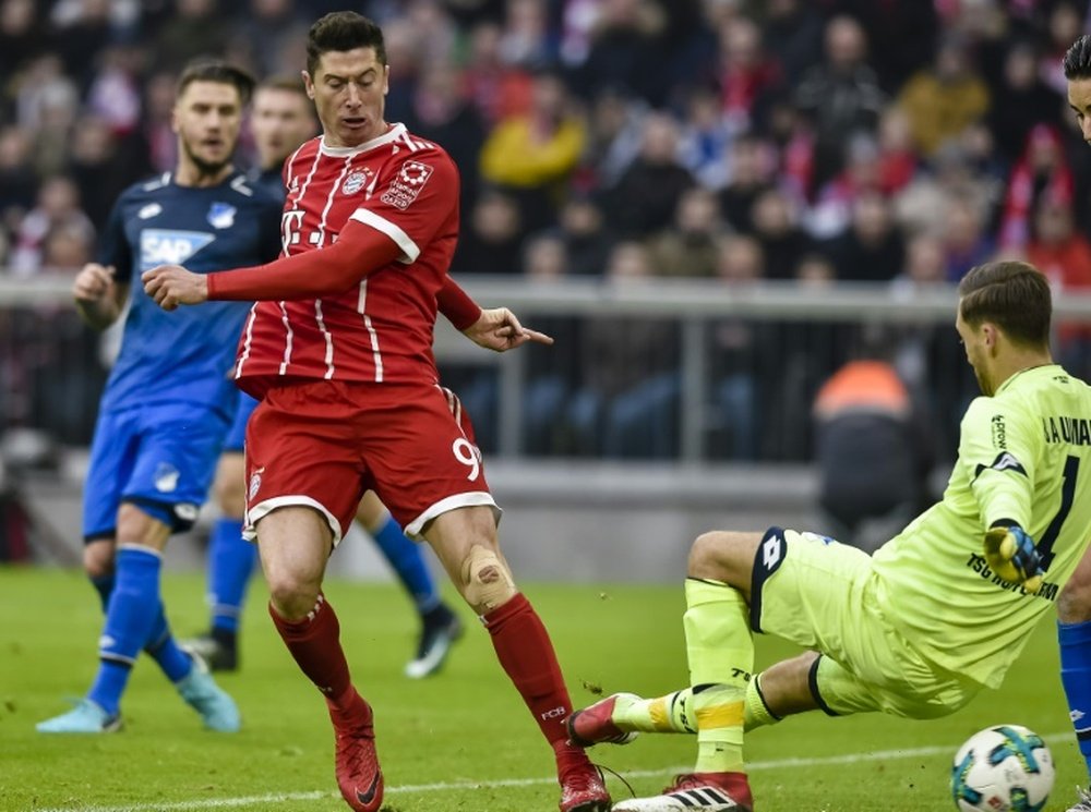 Bayern Munich's Robert Lewandowski scores a goal during their German first division Bundesliga match against Hoffenheim, in Munich, on January 27, 2018