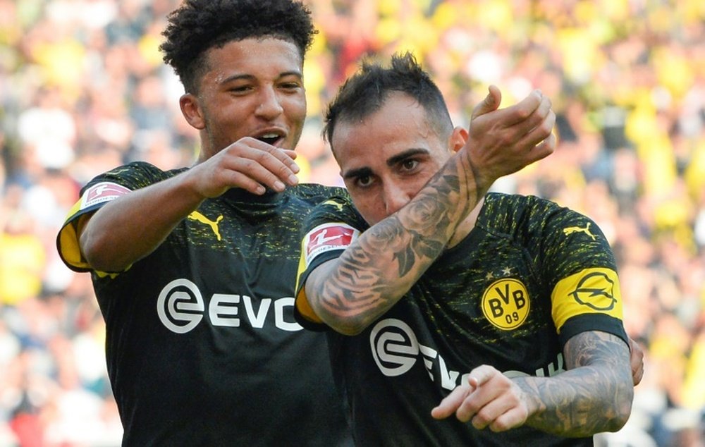 Paco Alcacer (R) and Jadon Sancho (L) could feature against Atletico. AFP